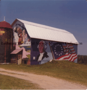 colorful painted barn with George Washington and 1776 painted on its side